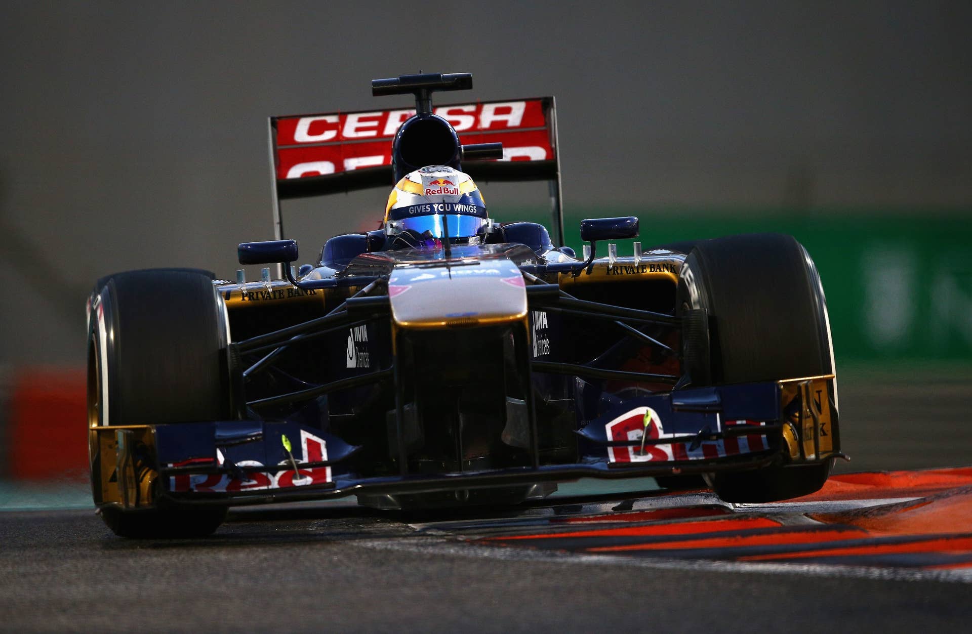 ABU DHABI, UNITED ARAB EMIRATES - NOVEMBER 03: Jean-Eric Vergne of France and Scuderia Toro Rosso drives during the Abu Dhabi Formula One Grand Prix at the Yas Marina Circuit on November 3, 2013 in Abu Dhabi, United Arab Emirates. (Photo by Clive Mason/Getty Images)