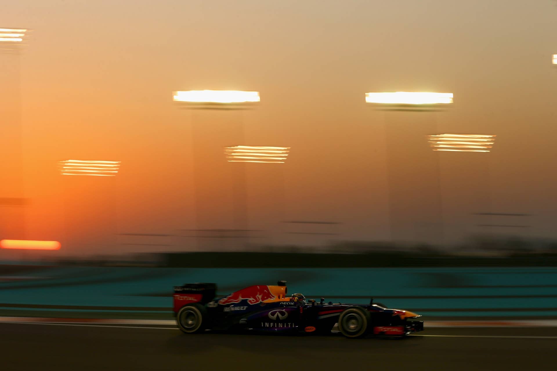 ABU DHABI, UNITED ARAB EMIRATES - NOVEMBER 03: Sebastian Vettel of Germany and Infiniti Red Bull Racing drives during the Abu Dhabi Formula One Grand Prix at the Yas Marina Circuit on November 3, 2013 in Abu Dhabi, United Arab Emirates. (Photo by Paul Gilham/Getty Images)