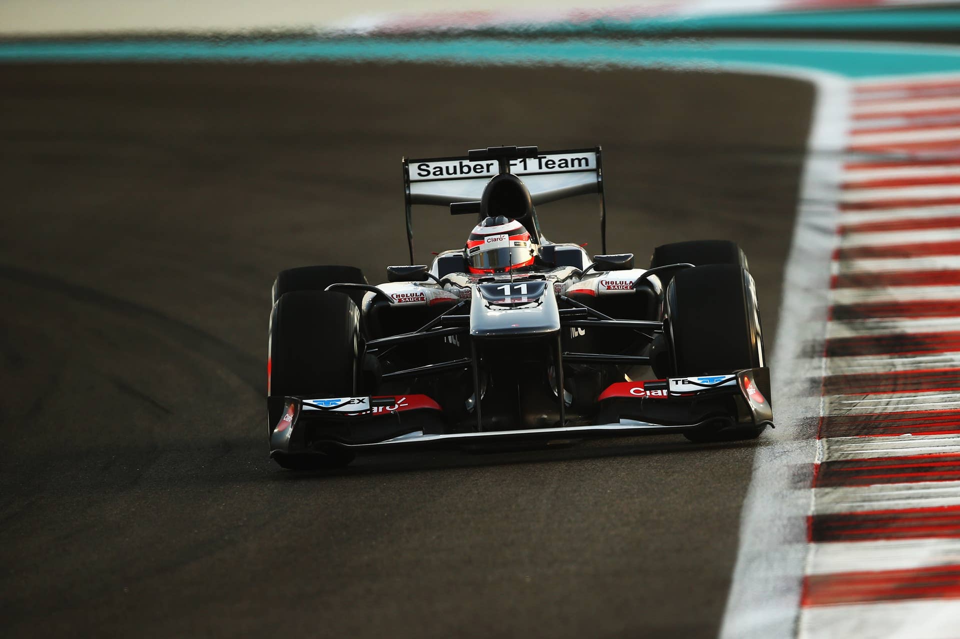 ABU DHABI, UNITED ARAB EMIRATES - NOVEMBER 02:  Nico Hulkenberg of Germany and Sauber F1 drives during qualifying for the Abu Dhabi Formula One Grand Prix at the Yas Marina Circuit on November 2, 2013 in Abu Dhabi, United Arab Emirates.  (Photo by Clive Mason/Getty Images)