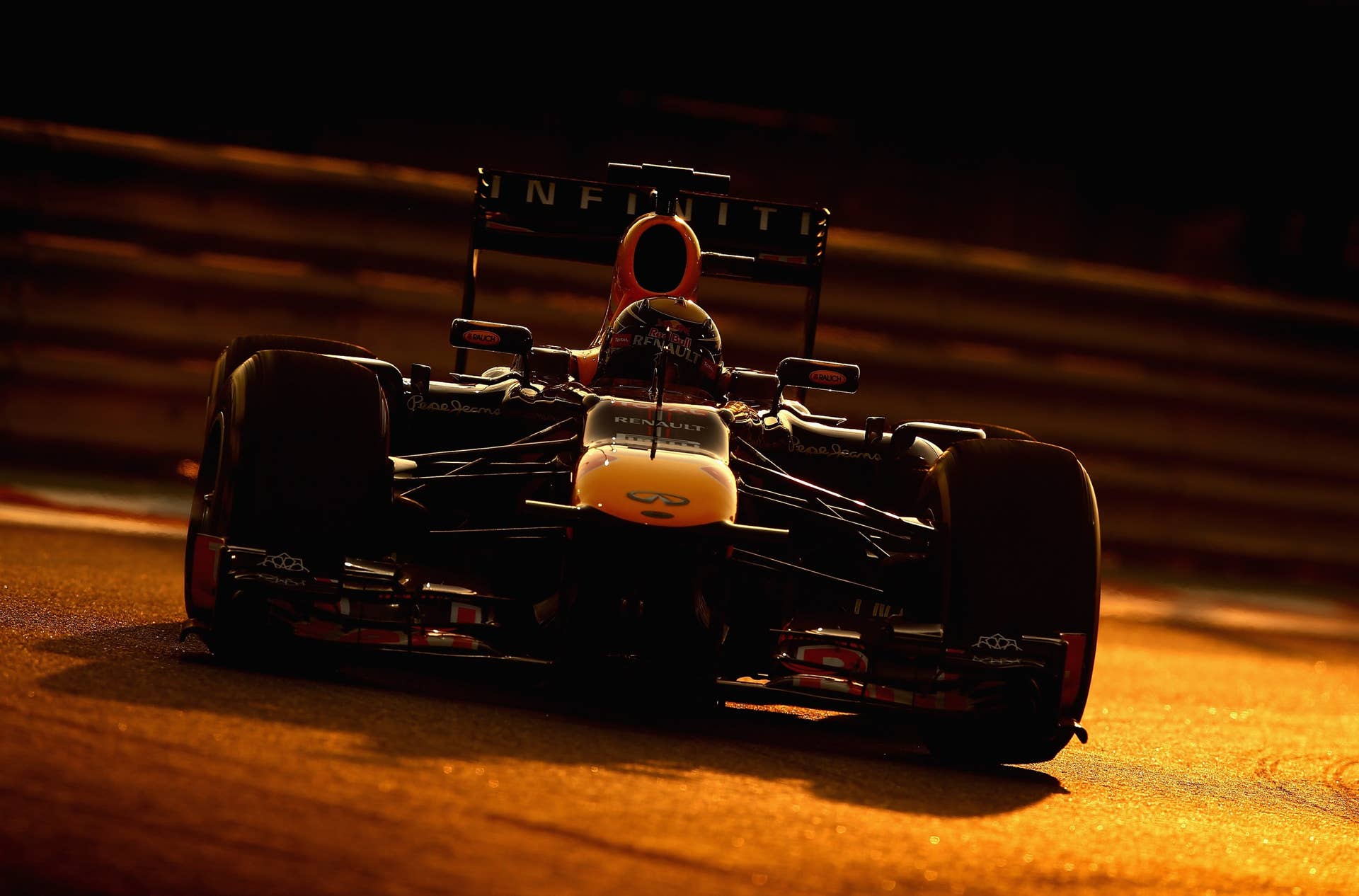 ABU DHABI, UNITED ARAB EMIRATES - NOVEMBER 03:  Sebastian Vettel of Germany and Infiniti Red Bull Racing drives during the Abu Dhabi Formula One Grand Prix at the Yas Marina Circuit on November 3, 2013 in Abu Dhabi, United Arab Emirates.  (Photo by Clive Mason/Getty Images)