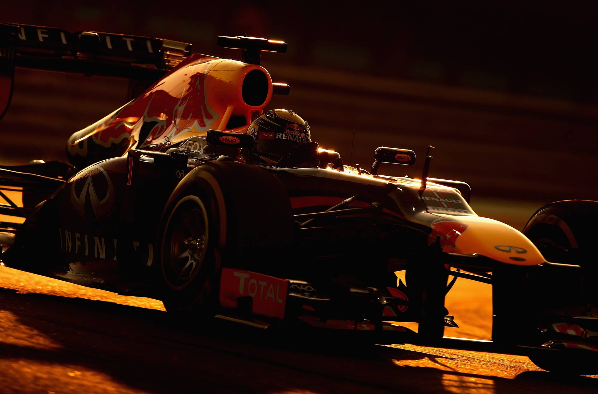 ABU DHABI, UNITED ARAB EMIRATES - NOVEMBER 03:  Sebastian Vettel of Germany and Infiniti Red Bull Racing drives during the Abu Dhabi Formula One Grand Prix at the Yas Marina Circuit on November 3, 2013 in Abu Dhabi, United Arab Emirates.  (Photo by Clive Mason/Getty Images)