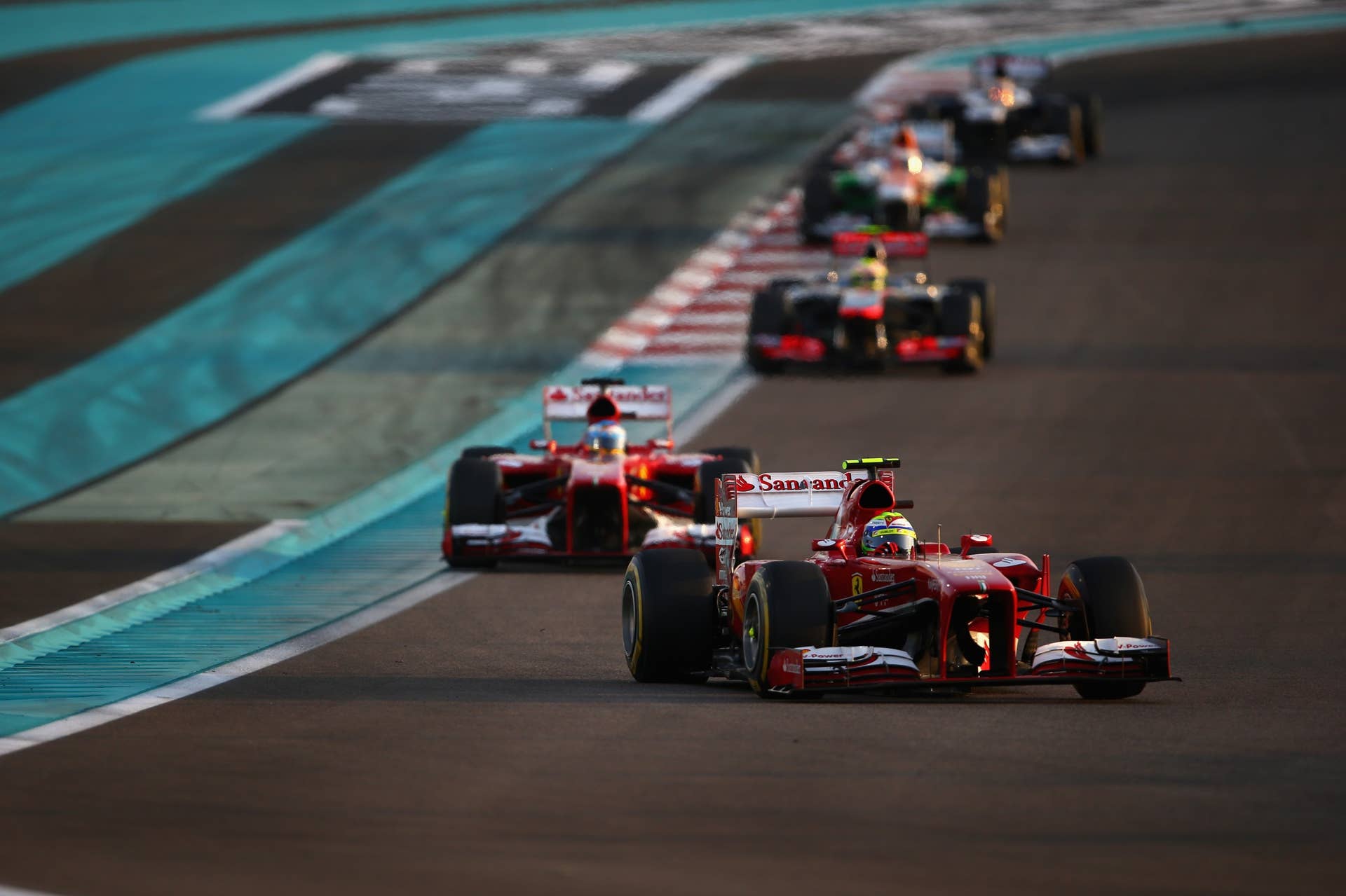 ABU DHABI, UNITED ARAB EMIRATES - NOVEMBER 03: Felipe Massa of Brazil and Ferrari drives during the Abu Dhabi Formula One Grand Prix at the Yas Marina Circuit on November 3, 2013 in Abu Dhabi, United Arab Emirates. (Photo by Paul Gilham/Getty Images)
