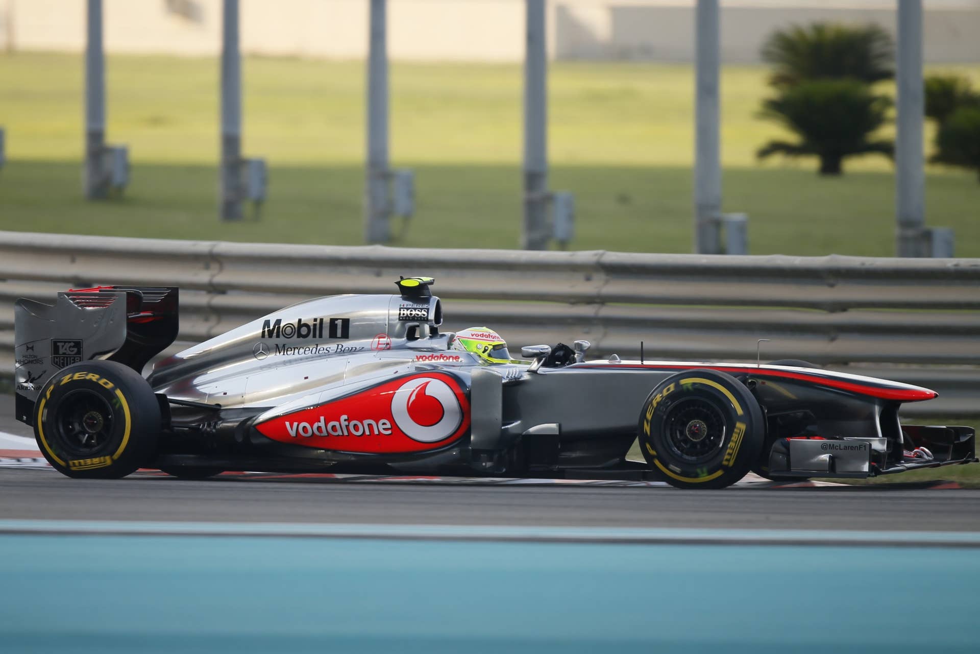 McLaren Mercedes' Mexican driver Sergio Perez  drives at the Yas Marina circuit in Abu Dhabi on November 3, 2013 during the Abu Dhabi Formula One Grand Prix.  AFP PHOTO / KARIM SAHIB        (Photo credit should read KARIM SAHIB/AFP/Getty Images)