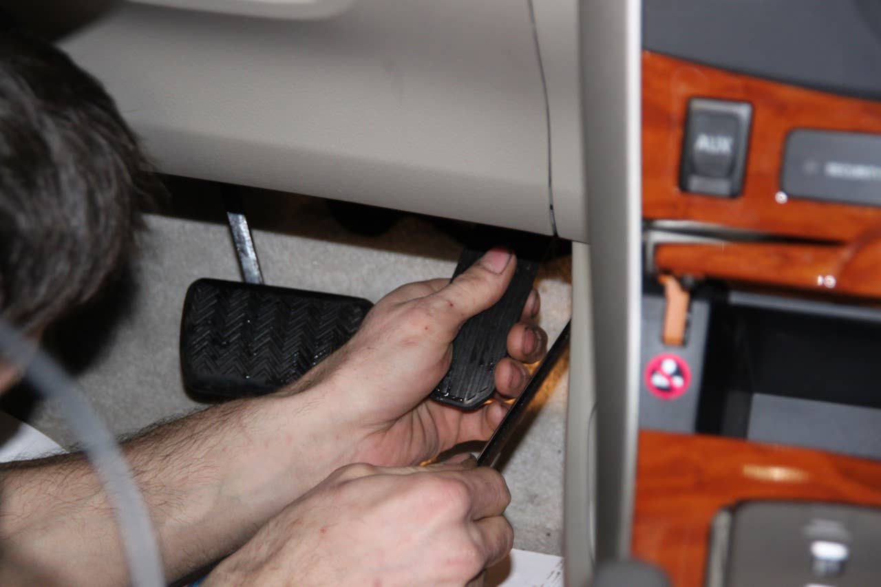 Removing the gas pedal.