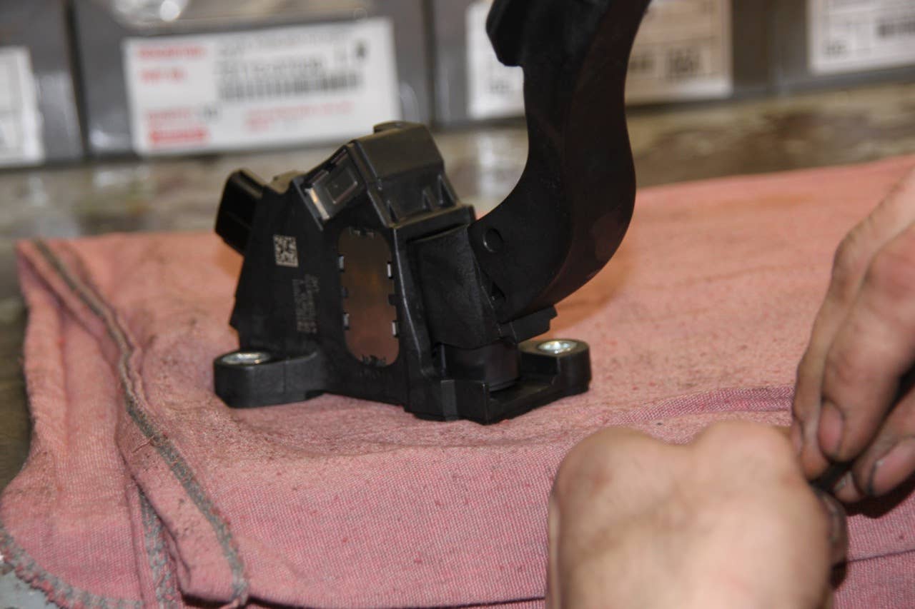 The pedal assembly on the work bench.