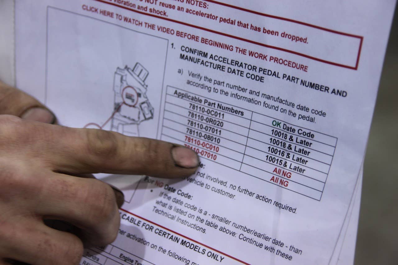 Doug Kropp checks the date chart to determine which pedal assemblies need to be updated.
