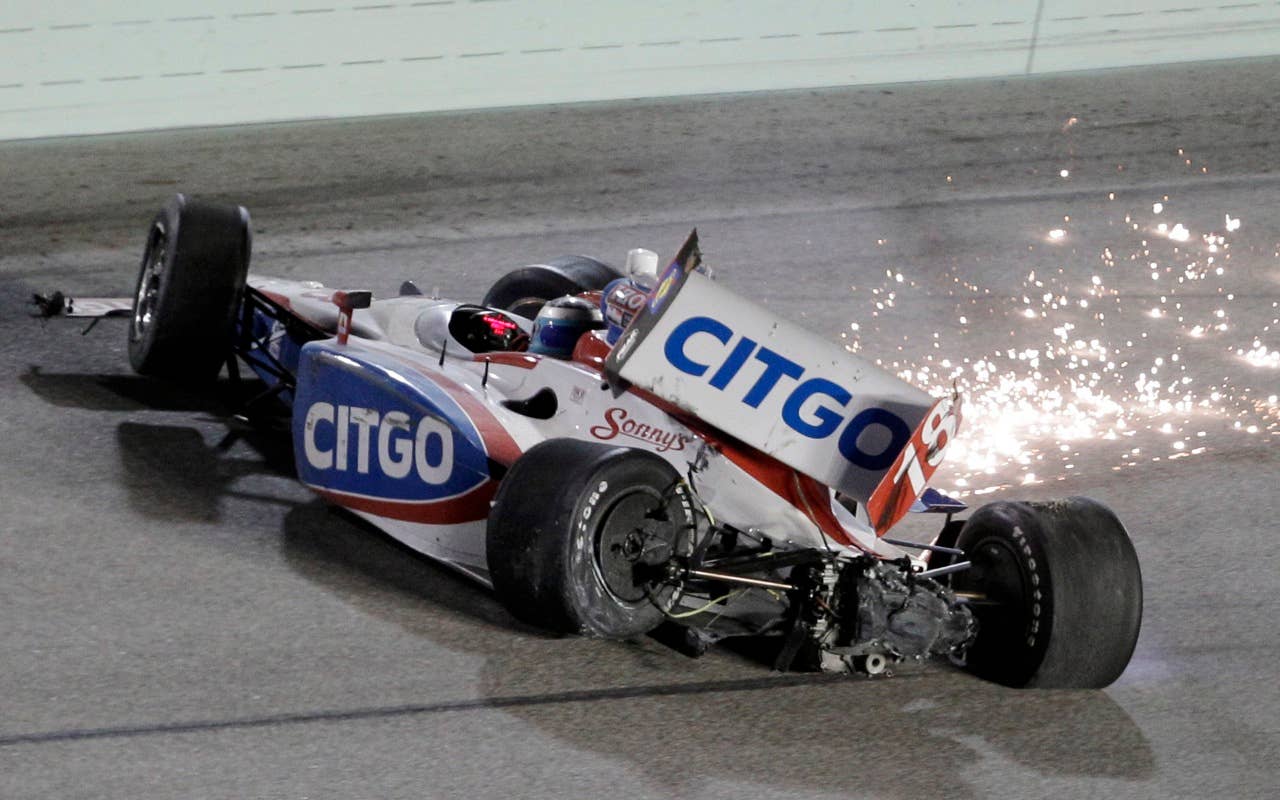 Milka Duno, of Venezuela, slides to a stop after hitting the wall during the IndyCar Series' Indy 300 auto race at Homestead-Miami Speedway in Homestead, Fla., Saturday, Oct. 2, 2010. (AP Photo/Alan Diaz)