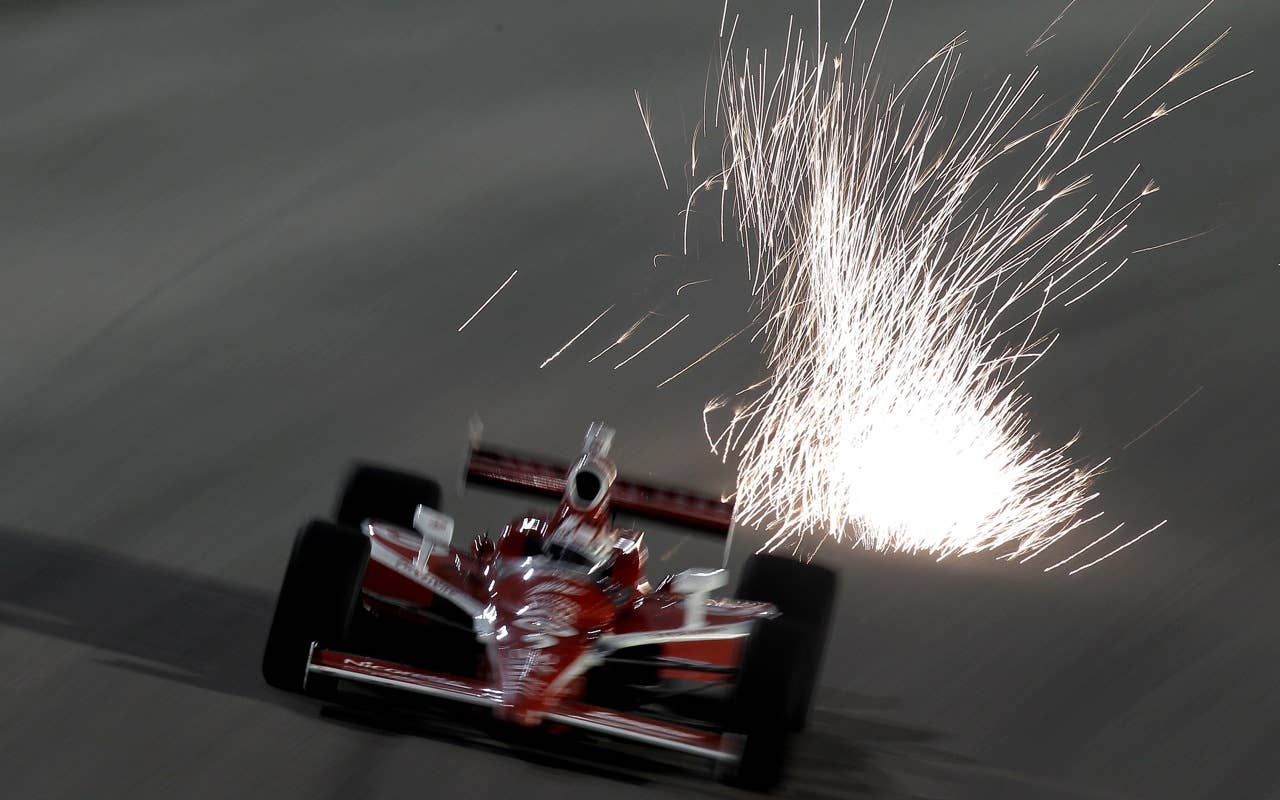 HOMESTEAD, FL - OCTOBER 01: Scott Dixon of New Zealand drives the #9 Target Chip Ganassi Racing Dallara Honda during practice for the IZOD IndyCar Series Cafes Do Brasil Indy 300 at Homestead-Miami Speedway on October 1, 2010 in Homestead, Florida. (Photo by Nick Laham/Getty Images) *** Local Caption *** Scott Dixon