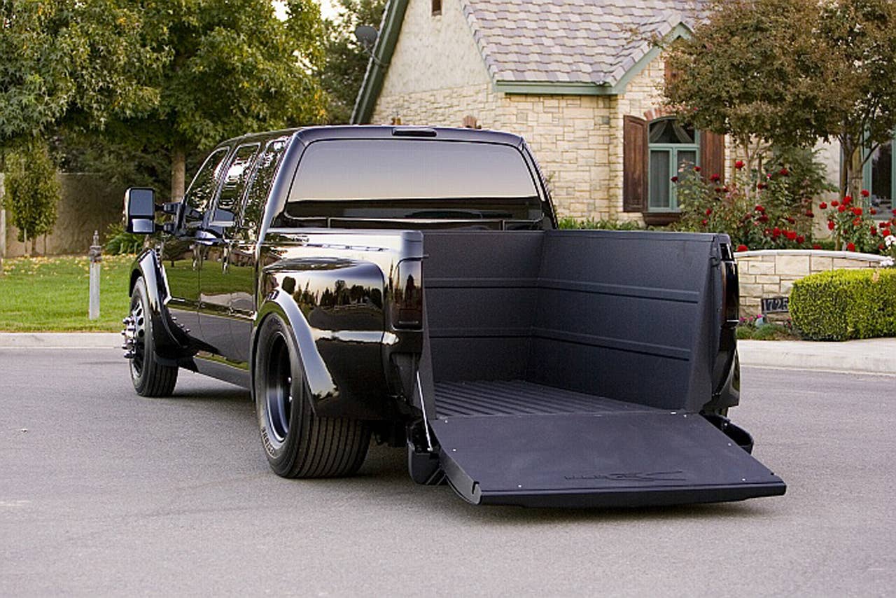If you truly love your bike, then you'll really love this truck. Dallas Smith Corp., the world's leader in Axleless®, Lo-floor? vehicles has applied its unique front-drive technology to the 2008 Ford F-450 Super Duty to deliver the ultimate hauler for your Harley. The 6.4-liter Powerstroke® turbo-diesel supplies plenty of pulling power for this low-rider, while the extra-extended cab and Katzkin leather interior provide plenty of comfort for the long haul. The Deep-V bed is custom-made for safe and secure transportation of your two-wheeled prized possession. Just drop the gate for easy loading and unloading. The DeBerti F-450 looks sharp in deep black PPG paint accented with bright purple pinstripes at the beltline and Alcoa aluminum wheels wearing large Bridgestones.