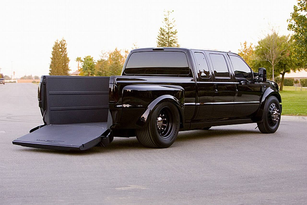 If you truly love your bike, then you'll really love this truck. Dallas Smith Corp., the world's leader in Axleless®, Lo-floor? vehicles has applied its unique front-drive technology to the 2008 Ford F-450 Super Duty to deliver the ultimate hauler for your Harley. The 6.4-liter Powerstroke® turbo-diesel supplies plenty of pulling power for this low-rider, while the extra-extended cab and Katzkin leather interior provide plenty of comfort for the long haul. The Deep-V bed is custom-made for safe and secure transportation of your two-wheeled prized possession. Just drop the gate for easy loading and unloading. The DeBerti F-450 looks sharp in deep black PPG paint accented with bright purple pinstripes at the beltline and Alcoa aluminum wheels wearing large Bridgestones.