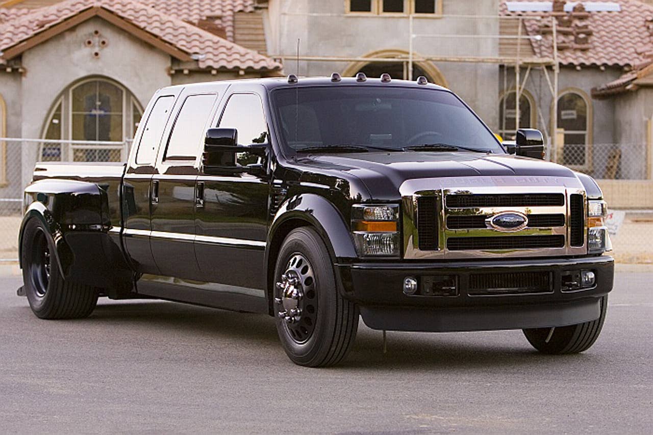 If you truly love your bike, then you'll really love this truck. Dallas Smith Corp., the world's leader in Axleless®, Lo-floor? vehicles has applied its unique front-drive technology to the 2008 Ford F-450 Super Duty to deliver the ultimate hauler for your Harley. The 6.4-liter Powerstroke® turbo-diesel supplies plenty of pulling power for this low-rider, while the extra-extended cab and Katzkin leather interior provide plenty of comfort for the long haul. The Deep-V bed is custom-made for safe and secure transportation of your two-wheeled prized possession. Just drop the gate for easy loading and unloading. The DeBerti F-450 looks sharp in deep black PPG paint accented with bright purple pinstripes at the beltline and Alcoa aluminum wheels wearing large Bridgestones.
