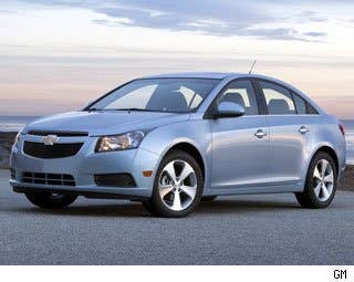 MSRP: $16,800 - $23,190 Invoice: $16,212 - $22,146  Fuel Economy: 25 mpg City, 36 mpg Highway  Until the Chevy Cruze debuted in 2010, we wondered if Chevrolet was ever going to take the compact-car category seriously. The last offering, the Cobalt, was dreadful and seemed worthy of Chinese highways, but not American.  The exterior of the Cruze is a little conservative, but we can forgive that when we consider what a good package the whole car is inside and out.  In LTZ trim, the dash is dominated by a tech-laden but well-sorted center stack and accented with broad swaths of leather. We're not talking vinyl with real leather grain here, either. GM has also done a great job of making sure that nearly anyone can fit behind the wheel– and we do mean anyone. The driver's seat can be positioned so far back that someone of normal height will have no chance of reaching the pedals or the steering wheel.  Research the Chevrolet Cruze Chevrolet Cruze Photos & Information Chevrolet Cruze Specs Chevrolet Cruze Local Dealer Price Quote