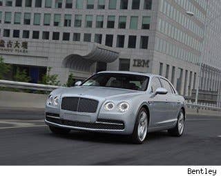 Bentley says this car was also designed for people who like driving. Tooling around the suburbs of Beijing was way more fun than I'd expected – and I'm not sure how much of that is due to China's excellent road system, or due to the easy driving dynamics of the Flying Spur. We drove from Beijing north to the Jinshanling section of the Great Wall, a drive that took about 3 hours on traffic-jammed roads, then smooth interstates, and finally on curvy local roads passing through small villages.  The steering on the Flying Spur was effortless. The 6.0-liter twin-turbo W-12 engine kicks up into higher speeds easily, and hums along at 100 mph as if it's no big thing. I mean, it's got 616 horsepower. It should be fast. The air suspension keeps the car floating above the road, so you can barely feel the bumps in the road. And there was very little body roll, so even when my driving partner was taking turns at 80 mph, the car felt very much in control.  There was virtually no wind noise penetrating the cabin. In fact, it was probably a little too quiet inside– you could barely hear the engine notes even when accelerating.