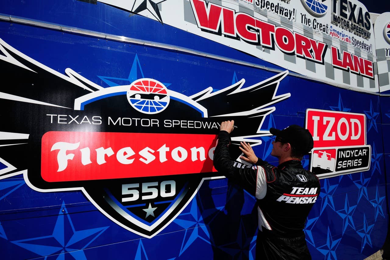 Briscoe signs the wall during qualifying for the IZOD IndyCar Series Firestone 550k at Texas Motor Speedway June 4, 2010 in Fort Worth, Texas.