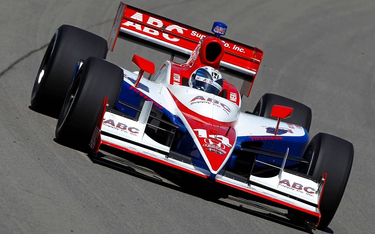 Vitor Meira of Brazil, drives the #14 ABC Supply Co. A.J. Foyt Racing Dallara Honda, during practice for the IRL Indycar Series Iowa Corn Indy 250 on June 19, 2010 at the Iowa Speedway in Newton, Iowa.