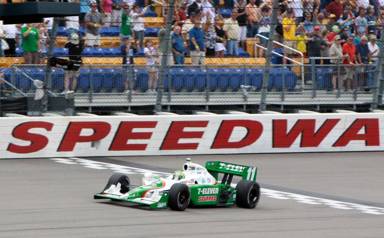 Tony Kanaan, of Brazil, wins the IndyCar Series' Iowa Corn Indy 250 auto race at Iowa Speedway in Newton, Iowa, Sunday, June 20, 2010.