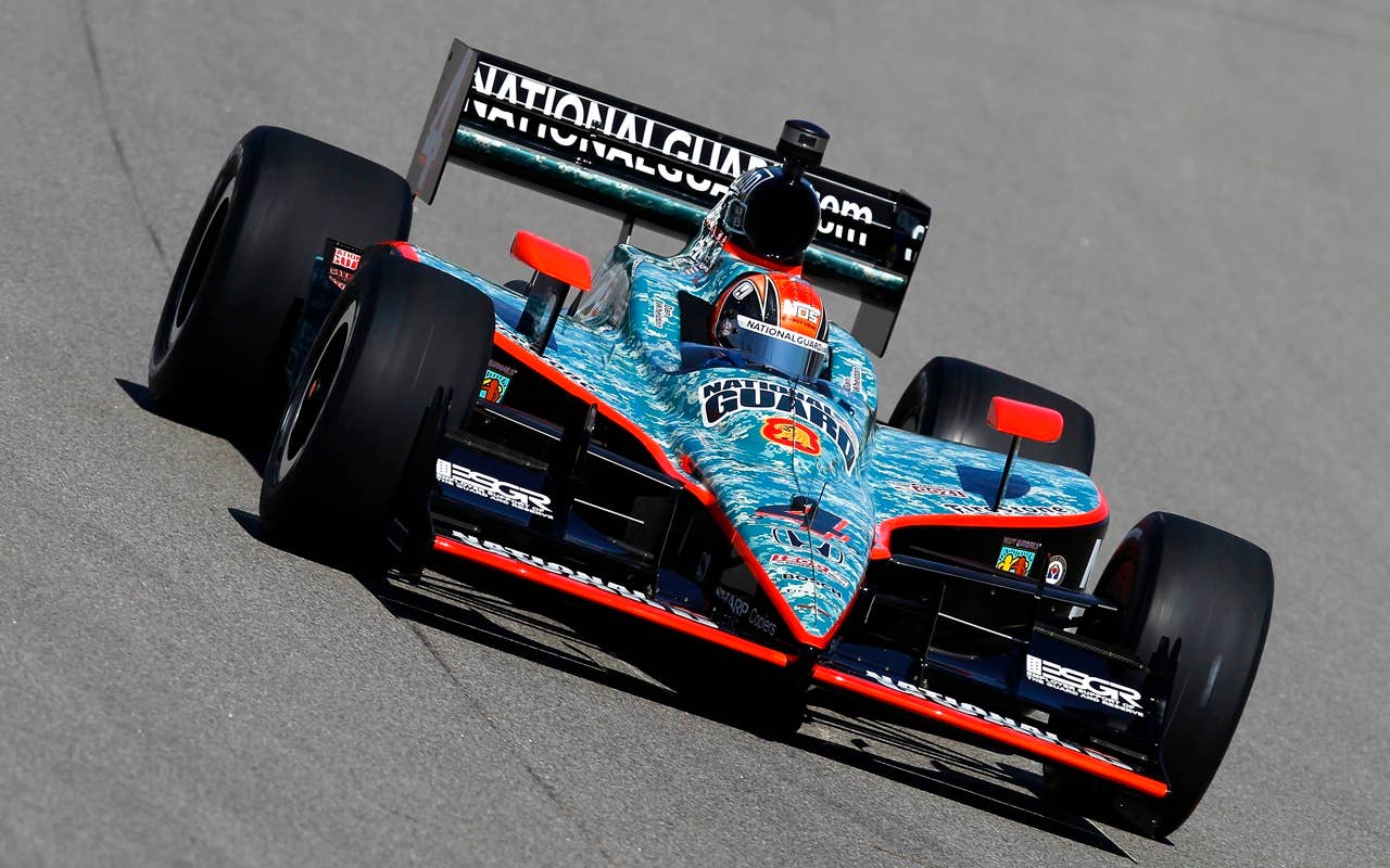 Dan Wheldon of England, driver of the #4 National Guard Panther Racing Dallara Honda, during practice for the IRL Indycar Series Iowa Corn Indy 250 on June 19, 2010 at the Iowa Speedway in Newton, Iowa.