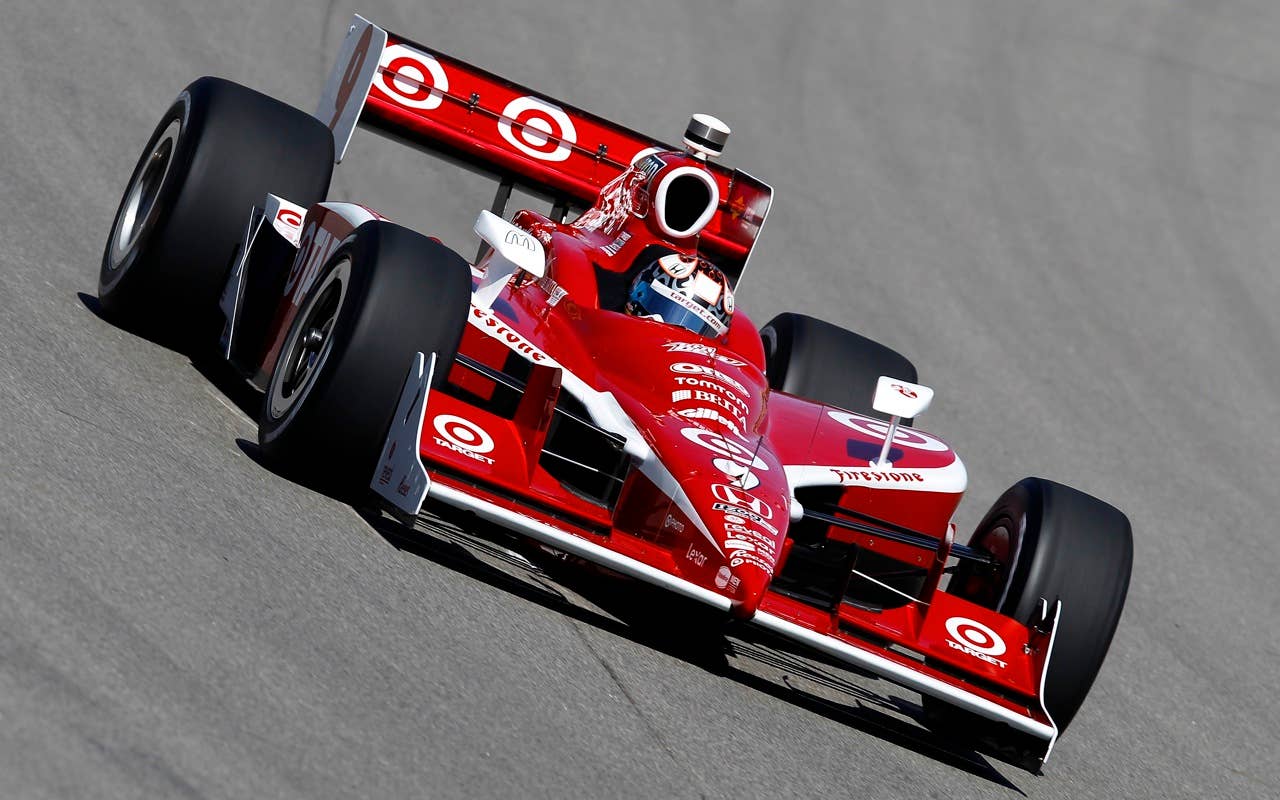 Scott Dixon drives the #9 Target Chip Ganassi Dallara Honda, during practice for the IRL Indycar Series Iowa Corn Indy 250 on June 19, 2010 at the Iowa Speedway in Newton, Iowa.