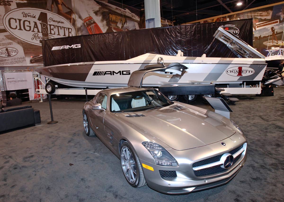Mercedes-Benz SLS AMG and Cigarette Racing Boat.