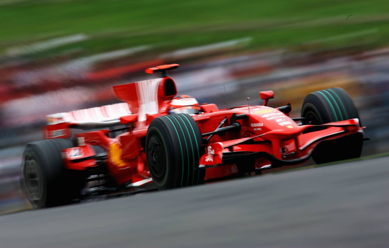 SHIZUOKA, JAPAN - OCTOBER 12: Kimi Raikkonen of Finland and Ferrari drives during the Japanese Formula One Grand Prix at the Fuji Speedway on October 12, 2008 in Shizuoka, Japan. (Photo by Clive Mason/Getty Images)