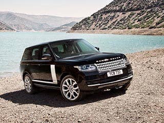 The Land Rover Range Rover is legendary for its off-road capabilities and its interior luxury. The base model comes with a 5.0-liter V8 engine that makes 375 horsepower, an eight-speed automatic transmission and a terrain response system. The terrain response system allows the driver to dial in the type of terrain the Range Rover is facing and it automatically adjusts its responses. That makes it easy for even the least experienced off-road driver to go wherever seems safest. Inside, the Range Rover has high-end leather and a choice between wood and lacquer finishes, as well as an optional rear-seat entertainment system to keep little survivors quiet while Mom and Dad argue over which kid they should trade for some gasoline.