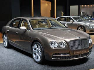 The 2014 Flying Spur, which drops the Continental from its name, promises to be Bentley's fastest, most powerful four-door ever in history. The car, which was shown in a sueded beige color, looked regal and stately sitting on the Geneva showroom floor.  Inside, the soft tan leather and wood trim make it feel like a high-end hotel room. Pictures don't do this car justice -- it is stylish and regal, albeit a tad formal and imposing.  The 6.0-liter W12 engine will get 616 horsepower and will go 0 to 60 in 4.3 seconds. And if you don't like it in brown, don't worry.Bentley will customize the color to anything your heart desires.