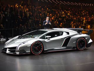 Lamborghini unveiled its Veneno supercar at the Geneva Motor Show -- an utterly insane vehicle displaying scoops, wings, fins and an absurd amount of carbon fiber.  The Veneno name comes from a notorious fighting bull that killed a matador back in 1914 and is meant to echo the car's aggressive nature. Boasting numbers of 750 horsepower and a top speed of 220 MPH,"aggressive" might even be an understatement.  Lamborghini is only building four of these supercars at $3.9 million a pop.