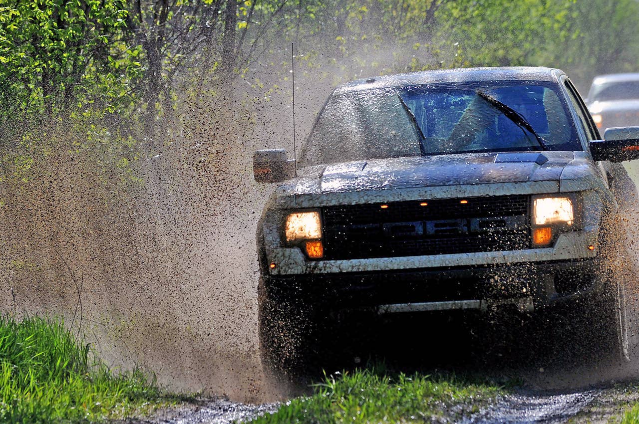 ROMEO, MI. MAY 14, 2010--2010 F-150 SVT Raptor --The 2010 F-150 SVT Raptor, equipped with the optional all-new 6.2-liter engine, hitting the woods. Photo by:  Sam VarnHagen/Ford Motor Co.