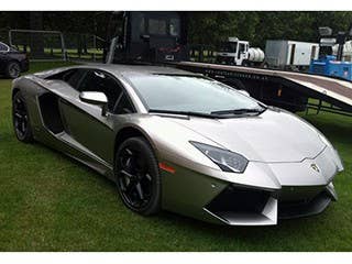 There aren't that many Lamborghini Aventadors built and sold each year. But this one, in gun-metal paint, is the way we would want ours. For the final movie in Christopher Nolan's trilogy, TheDark Knight rides around powered by a V12 engine and 700 horsepower.  Holy horsepower, Batman!