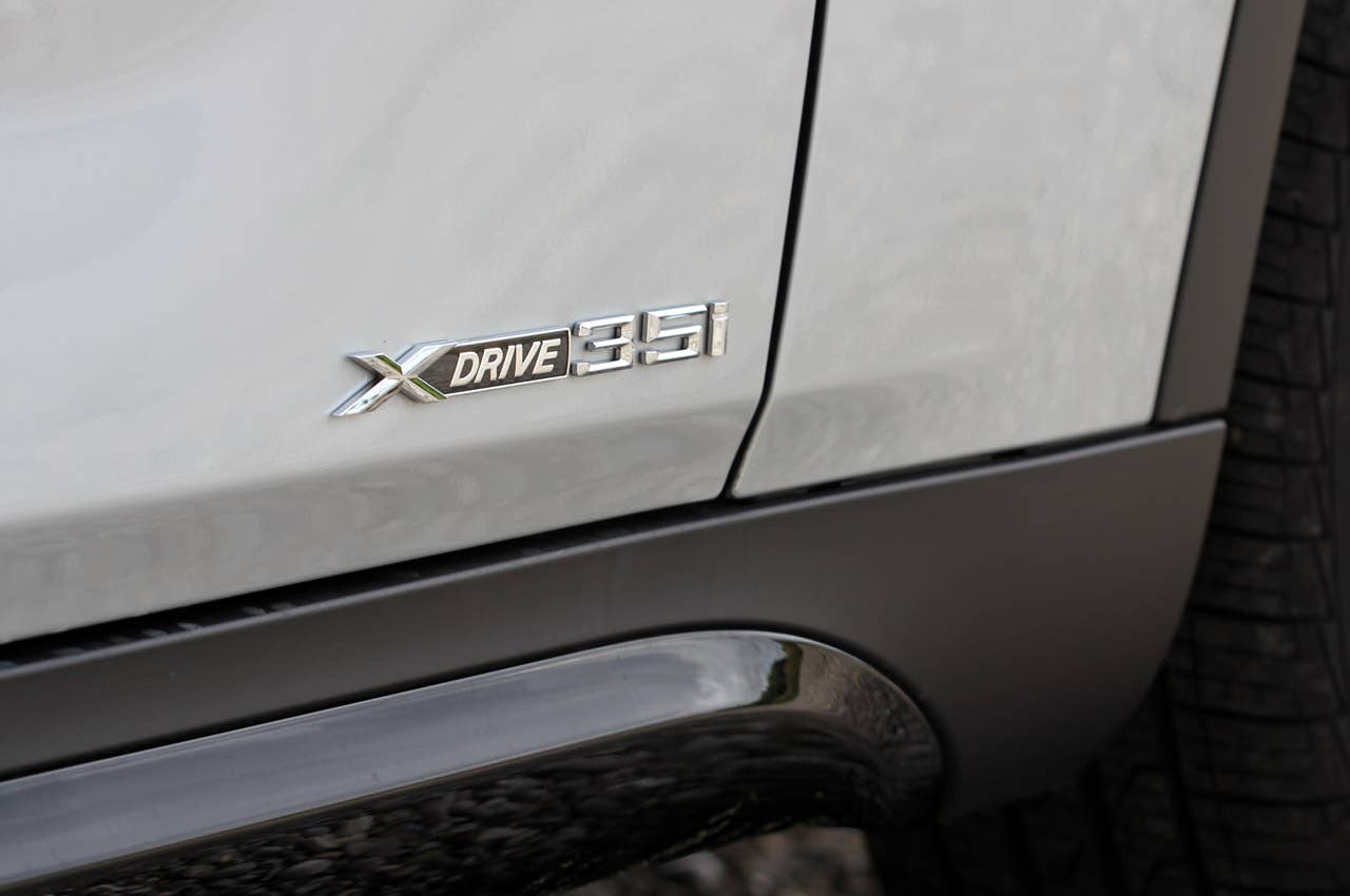 2013 BMW X1 badge