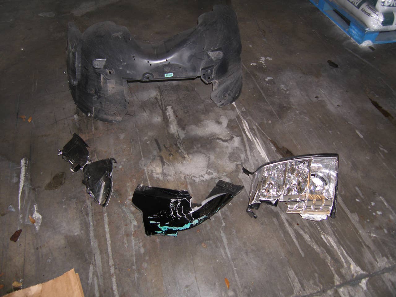 ORLANDO, FL - DECEMBER 02:  In this handout photo provided by The Florida Highway Patrol, pieces of the vehicle driven by Tiger Woods during his accident is seen on December 2, 2009 in Orlando, Florida. Woods crashed the SUV into the fire hydrant and tree next to his Florida home in the early hours of November 27.  FHP charged Woods with careless driving which carries a $164 fine and four points on his driving record. Woods released a statement on his website saying, 'I have let my family down and I regret those transgressions with all of my heart.'.  (Photo by Florida Highway Patrol via Getty Images)