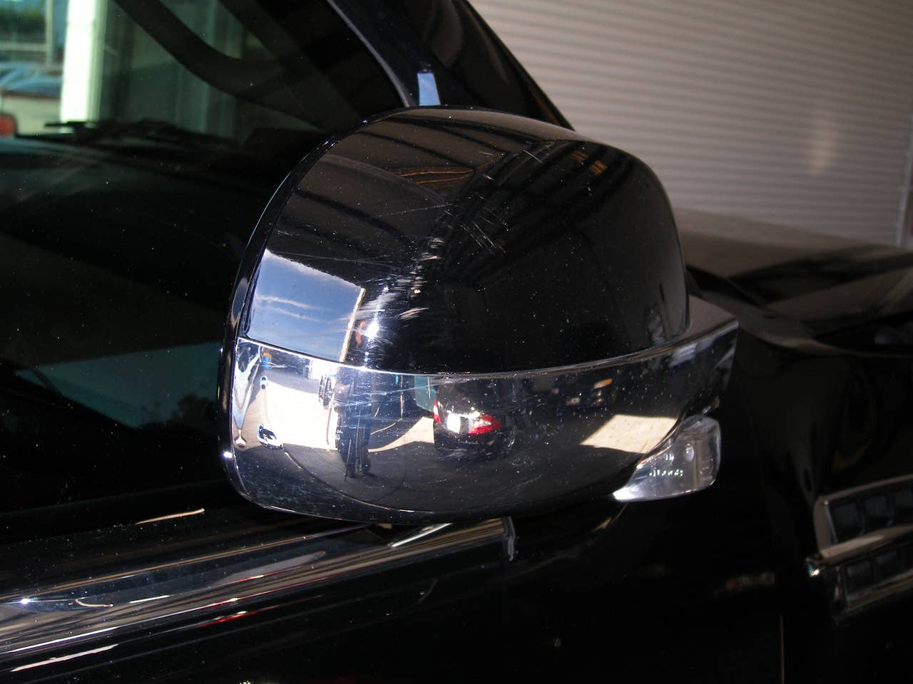 ORLANDO, FL - DECEMBER 02:  In this handout photo provided by The Florida Highway Patrol, a side view mirror from the vehicle driven by Tiger Woods during his accident is seen on December 2, 2009 in Orlando, Florida. Woods crashed the SUV into the fire hydrant and tree next to his Florida home in the early hours of November 27.  FHP charged Woods with careless driving which carries a $164 fine and four points on his driving record. Woods released a statement on his website saying, 'I have let my family down and I regret those transgressions with all of my heart.'.  (Photo by Florida Highway Patrol via Getty Images)