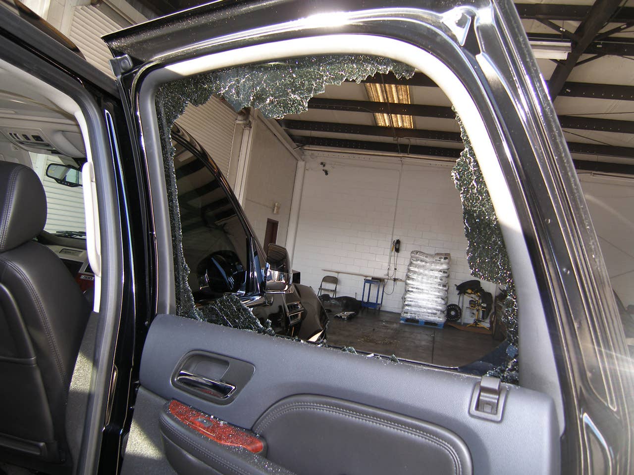 ORLANDO, FL - DECEMBER 02:  In this handout photo provided by The Florida Highway Patrol, a broken window from the vehicle driven by Tiger Woods during his accident is seen on December 2, 2009 in Orlando, Florida. Woods crashed the SUV into the fire hydrant and tree next to his Florida home in the early hours of November 27.  FHP charged Woods with careless driving which carries a $164 fine and four points on his driving record. Woods released a statement on his website saying, 'I have let my family down and I regret those transgressions with all of my heart.'.  (Photo by Florida Highway Patrol via Getty Images)