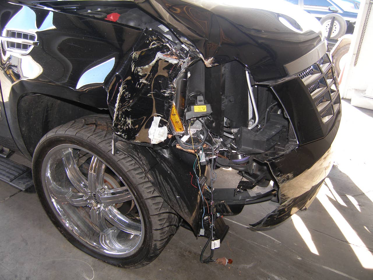 ORLANDO, FL - DECEMBER 02:  In this handout photo provided by The Florida Highway Patrol, the vehicle driven by Tiger Woods during his accident is seen on December 2, 2009 in Orlando, Florida. Woods crashed the SUV into the fire hydrant and tree next to his Florida home in the early hours of November 27.  FHP charged Woods with careless driving which carries a $164 fine and four points on his driving record. Woods released a statement on his website saying, 'I have let my family down and I regret those transgressions with all of my heart.'.  (Photo by Florida Highway Patrol via Getty Images)
