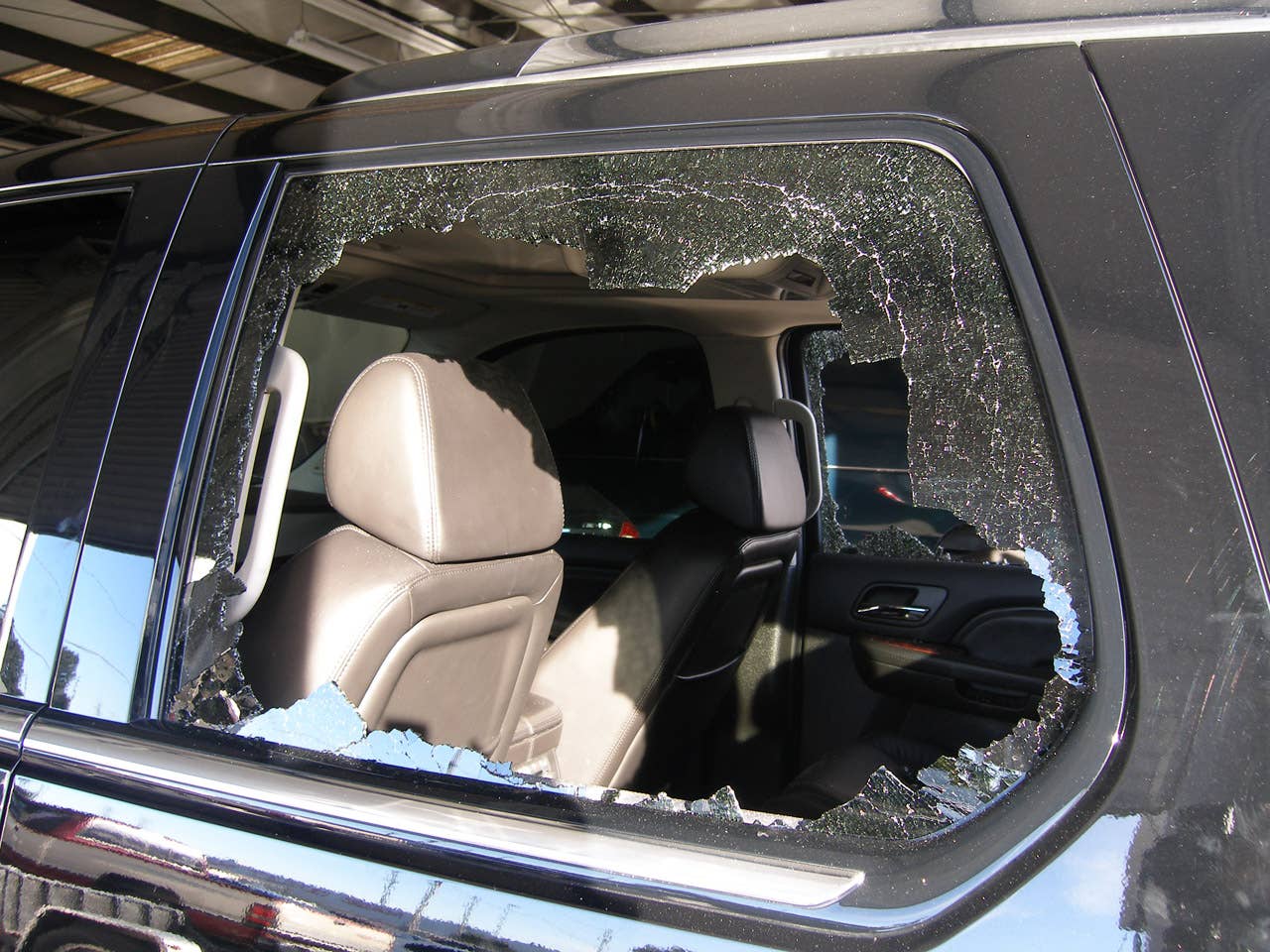 ORLANDO, FL - DECEMBER 02:  In this handout photo provided by The Florida Highway Patrol, a broken window from the vehicle driven by Tiger Woods during his accident is seen on December 2, 2009 in Orlando, Florida. Woods crashed the SUV into the fire hydrant and tree next to his Florida home in the early hours of November 27.  FHP charged Woods with careless driving which carries a $164 fine and four points on his driving record. Woods released a statement on his website saying, 'I have let my family down and I regret those transgressions with all of my heart.'.  (Photo by Florida Highway Patrol via Getty Images)