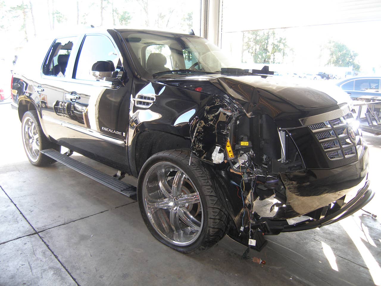 ORLANDO, FL - DECEMBER 02:  In this handout photo provided by The Florida Highway Patrol, the vehicle driven by Tiger Woods during his accident is seen on December 2, 2009 in Orlando, Florida. Woods crashed the SUV into the fire hydrant and tree next to his Florida home in the early hours of November 27.  FHP charged Woods with careless driving which carries a $164 fine and four points on his driving record. Woods released a statement on his website saying, 'I have let my family down and I regret those transgressions with all of my heart.'.  (Photo by Florida Highway Patrol via Getty Images)