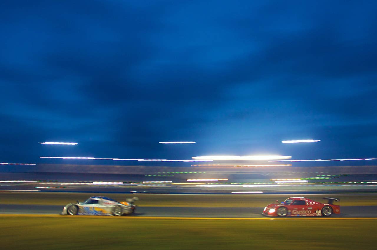 28-31 January, 2010, Daytona Beach, Florida, USA A pair of prototypes races under darkening skies on Saturday night.