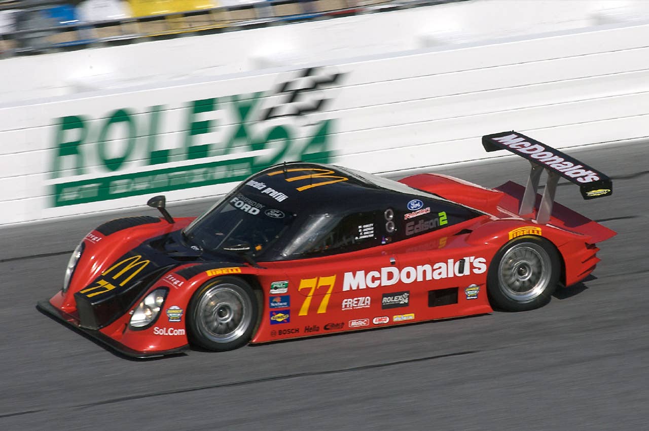 28-31 January, 2010, Daytona Beach, Florida, USA The #77 Ford Dallara of Memo Gidley, Fabrizio Gollin, Brad Jaeger , and Derek Johnston races down the frontstretch during practice. 2010, R.D. Ethan, USA LAT Photographic