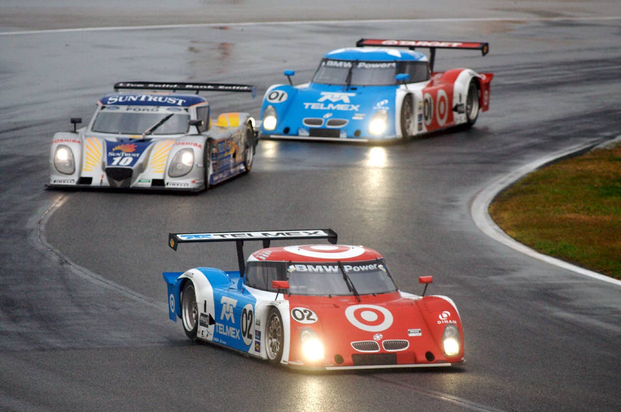 28-31 January, 2010, Daytona Beach, Florida, USA The #02 BMW Riley of Dario Franchitti, Scott Dixon, Jamie McMurray and Juan Pablo Montoya leads a pack of cars through a turn. 2010, R.D. Ethan, USA LAT Photographic
