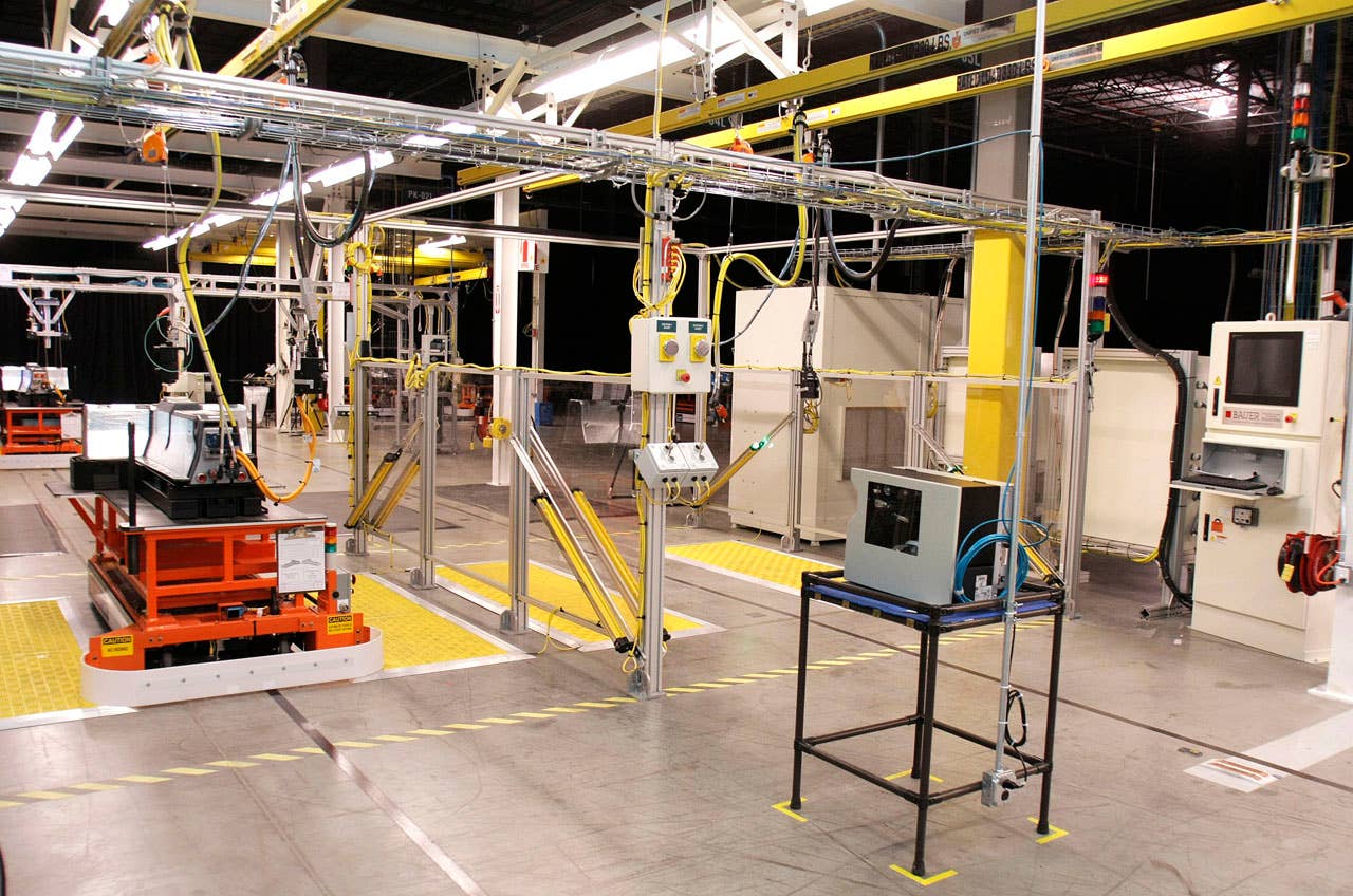BROWNSTOWN TOWNSHIP, MI -  JANUARY 07: A battery pack (left) for the General Motors Chevrolet Volt extended-range electric vehicle sits on display on the assembly line at the GM Brownstown Battery Pack Assembly Plant January 7, 2010 in Brownstown Township, Michigan.  GM is the first major automaker to manufacture an advanced lithium-ion battery pack in the U.S. Image by Bill Pugliano/Getty Images.