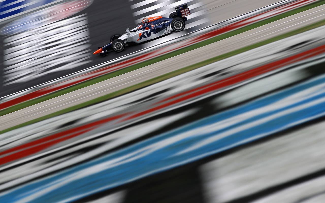 SPARTA, KY - SEPTEMBER 03:  Mario Moraes of Brazil, driver of the #32 KV Racing Technology Dallara Honda, during practice for the IndyCar Series Kentucky Indy 300 at Kentucky Speedway on September 3, 2010 in Sparta, Kentucky.  (Photo by Streeter Lecka/Getty Images) *** Local Caption *** Mario Moraes