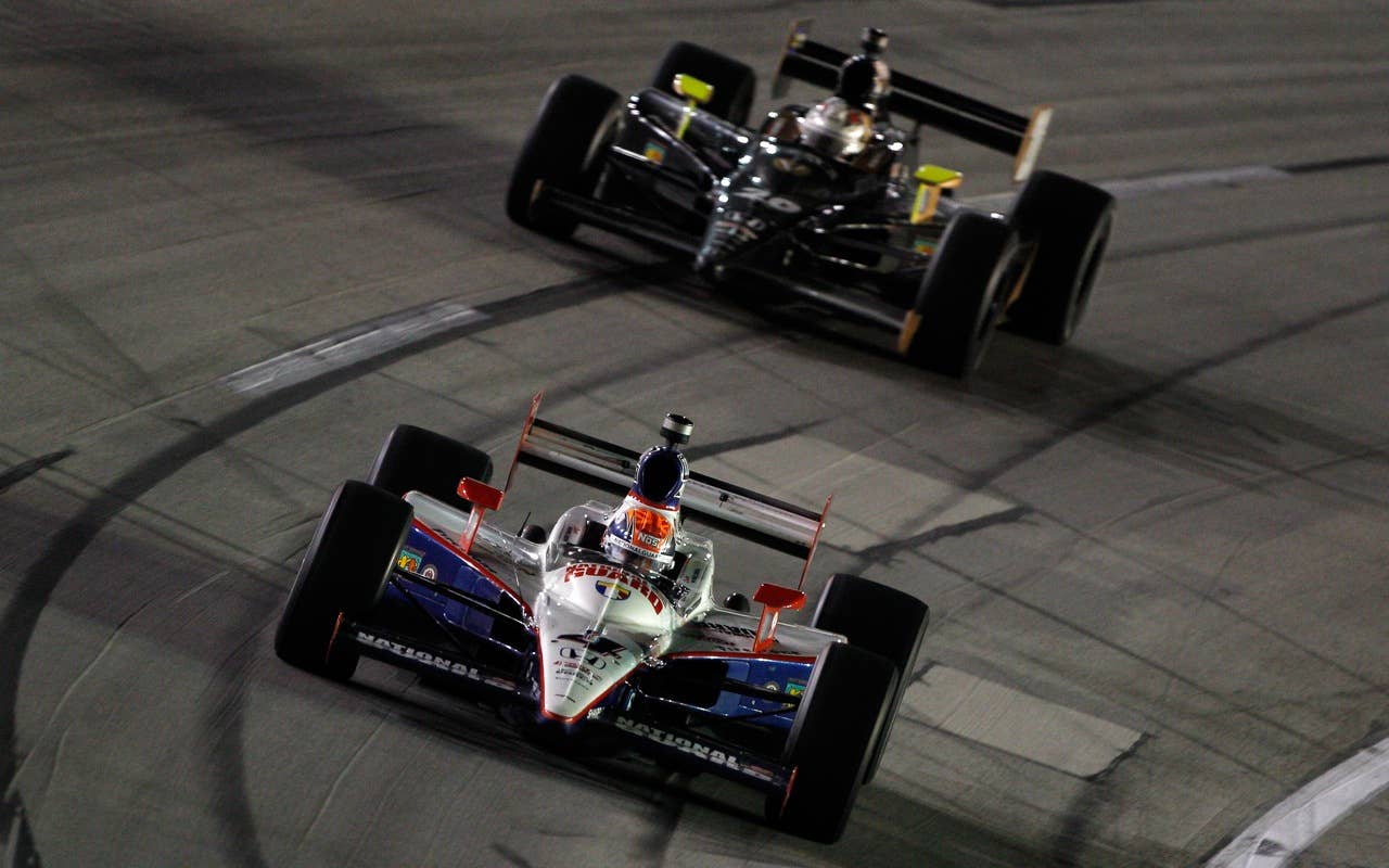 SPARTA, KY - SEPTEMBER 04:  Dan Wheldon of England, driver of the #4 National Guard Panther Racing Dallara Honda leads a pack of cars during the IndyCar Series Kentucky Indy 300 on September 4, 2010 in Sparta, Kentucky.  (Photo by Chris Graythen/Getty Images) *** Local Caption *** Dan Wheldon