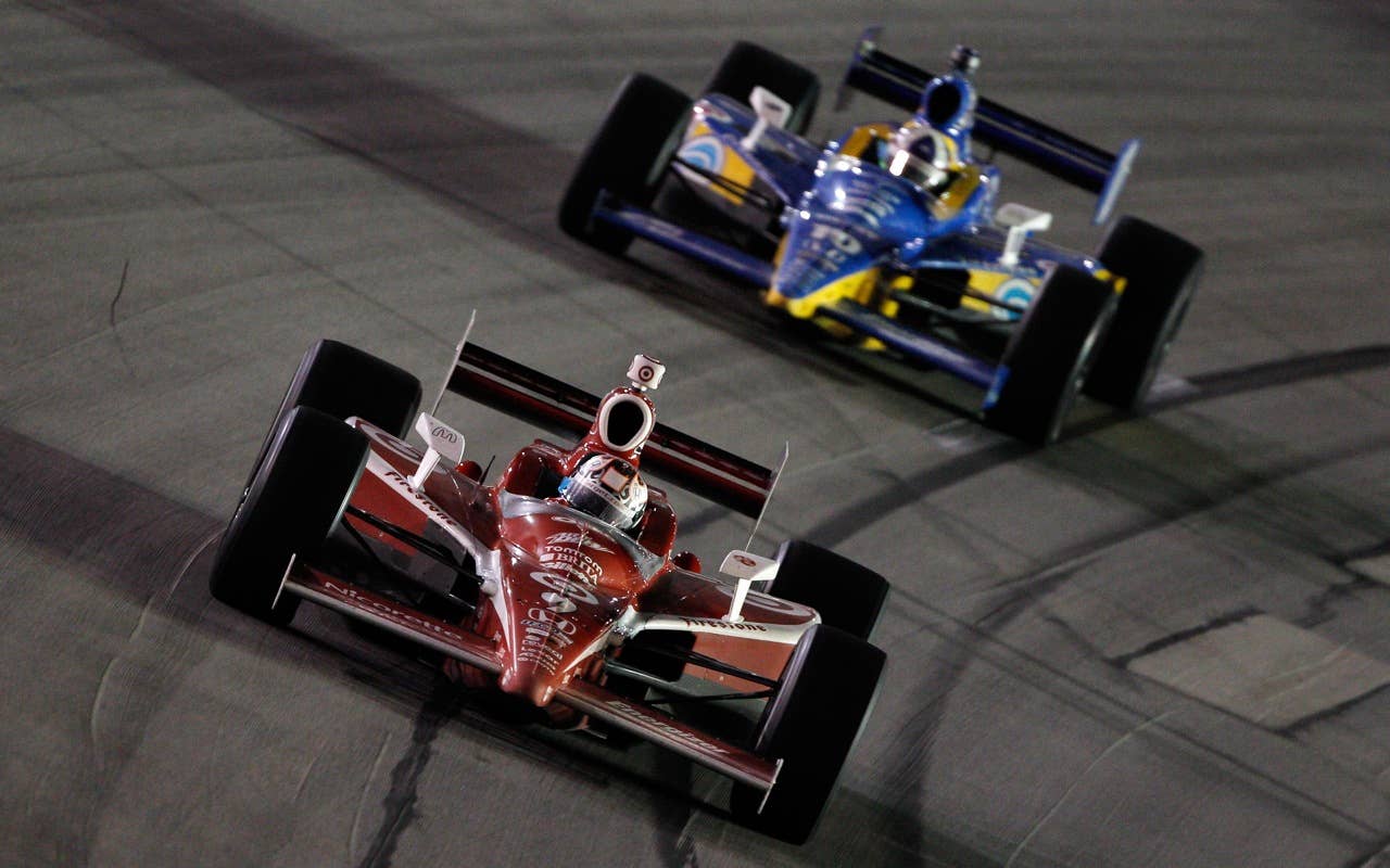 SPARTA, KY - SEPTEMBER 04:  Scott Dixon of New Zealand, driver of the #9 Target Chip Ganassi Racing Dallara Honda leads Dario Franchitti of Scotland, driver of the #10 Dixie Target Chip Ganassi Racing Dallara Honda during the IndyCar Series Kentucky Indy 300 on September 4, 2010 in Sparta, Kentucky.  (Photo by Chris Graythen/Getty Images) *** Local Caption *** Scott Dixon;Dario Franchitti