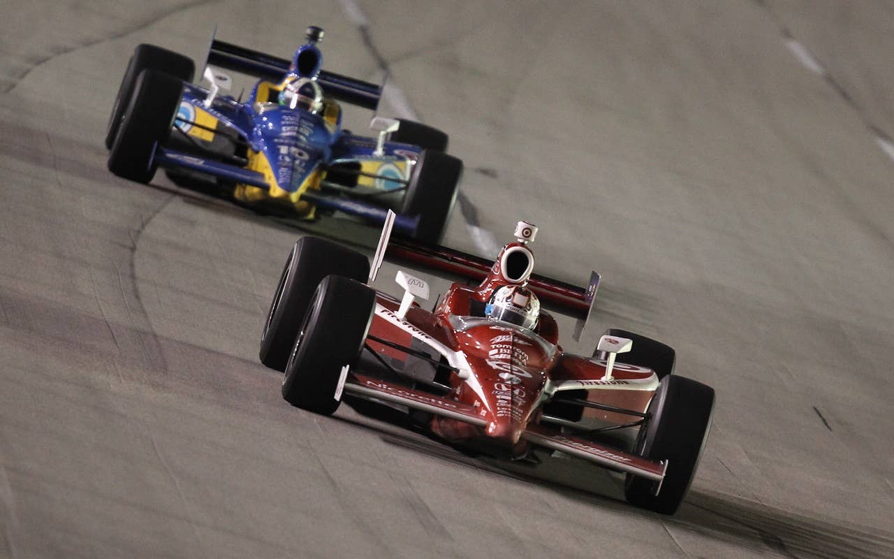 SPARTA, KY - SEPTEMBER 04:  Scott Dixon of New Zealand, driver of the #9 Target Chip Ganassi Racing Dallara Honda, leads teammate Dario Frachitti of Scotland, driver of the #10 Dixie Target Chip Ganassi Racing Dallara Honda during the IndyCar Series Kentucky Indy 300 at Kentucky Speedway on September 4, 2010 in Sparta, Kentucky.  (Photo by Streeter Lecka/Getty Images) *** Local Caption *** Scott Dixon;Dario Franchitti