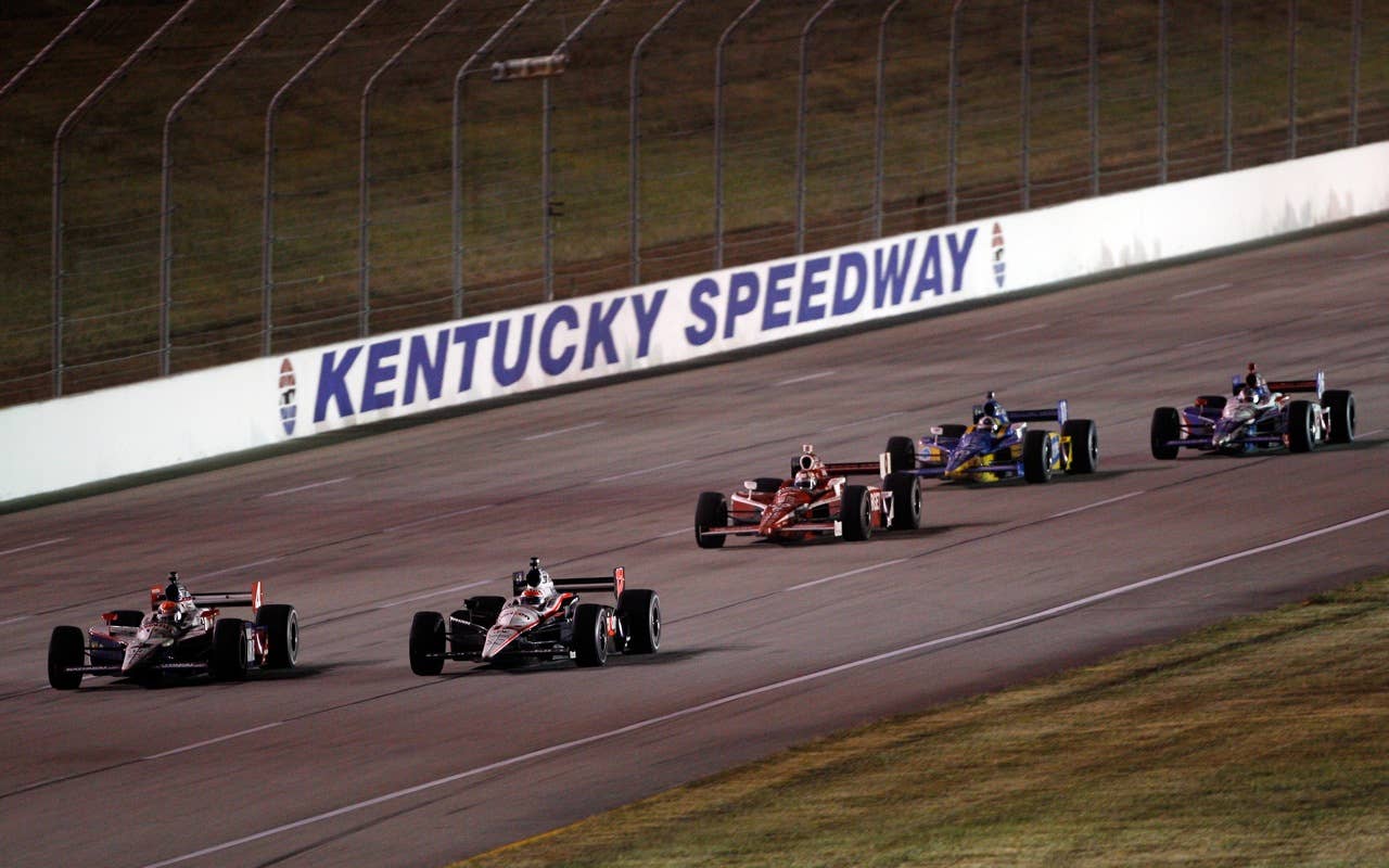SPARTA, KY - SEPTEMBER 04:  Dan Wheldon of England, driver of the #4 National Guard Panther Racing Dallara Honda leads a pack of cars during the IndyCar Series Kentucky Indy 300 on September 4, 2010 in Sparta, Kentucky.  (Photo by Chris Graythen/Getty Images) *** Local Caption *** Dan Wheldon