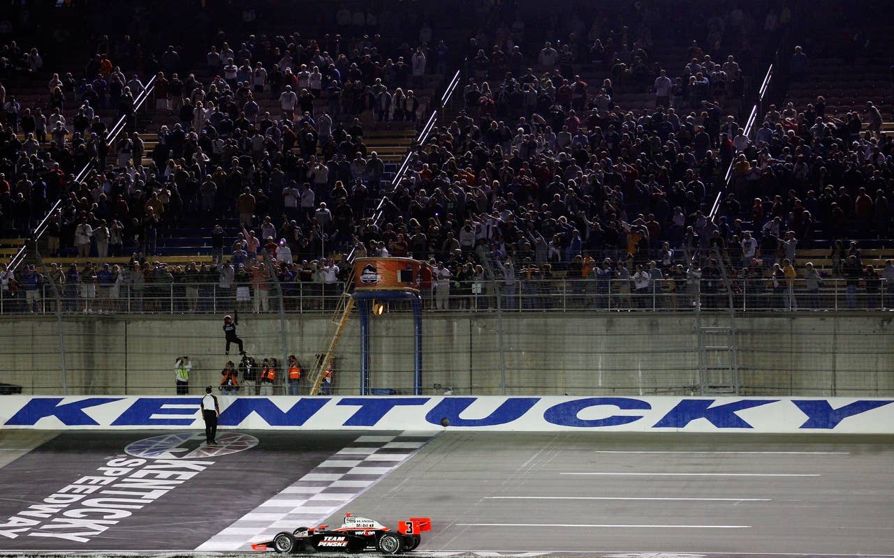 SPARTA, KY - SEPTEMBER 04:  Helio Castroneves of Brazil, driver of the #3 Team Penske Dallara Honda celebrates after winning the IndyCar Series Kentucky Indy 300 on September 4, 2010 in Sparta, Kentucky.  (Photo by Chris Graythen/Getty Images) *** Local Caption *** Helio Castroneves