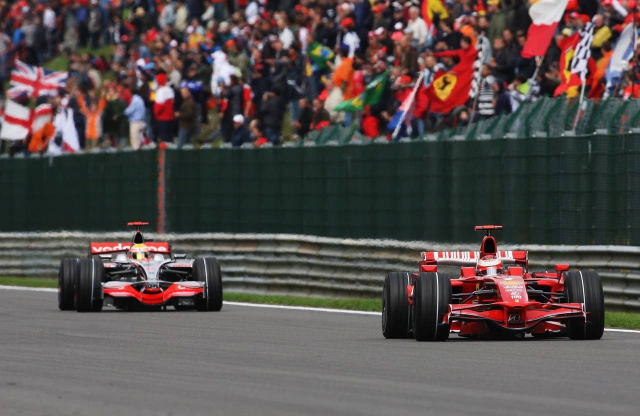 SPA FRANCORCHAMPS, BELGIUM - SEPTEMBER 07: Kimi Raikkonen of Finland and Ferrari leads from Lewis Hamilton of Great Britain and McLaren Mercedes during the Belgian Grand Prix at the Circuit of Spa Francorchamps on September 7, 2008 in Spa Francorchamps, Belgium. (Photo by Bryn Lennon/Getty Images)