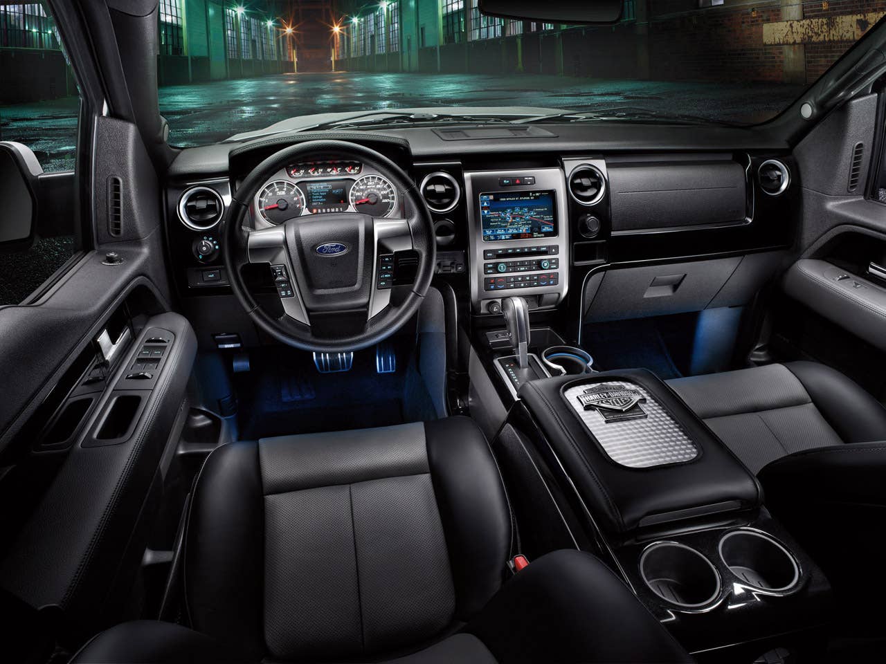 2011 Ford Harley-Davidson F-150: Interior trim panels on the 2011 Ford Harley-Davidson F-150 are covered in Tuxedo Black paint, while the door scuff plate and console lid carry an engine-turned finish. All interior chrome surfaces feature a new satin finish. Premium leather-trimmed seats come with accent color inserts and a unique cloisonn badge.
