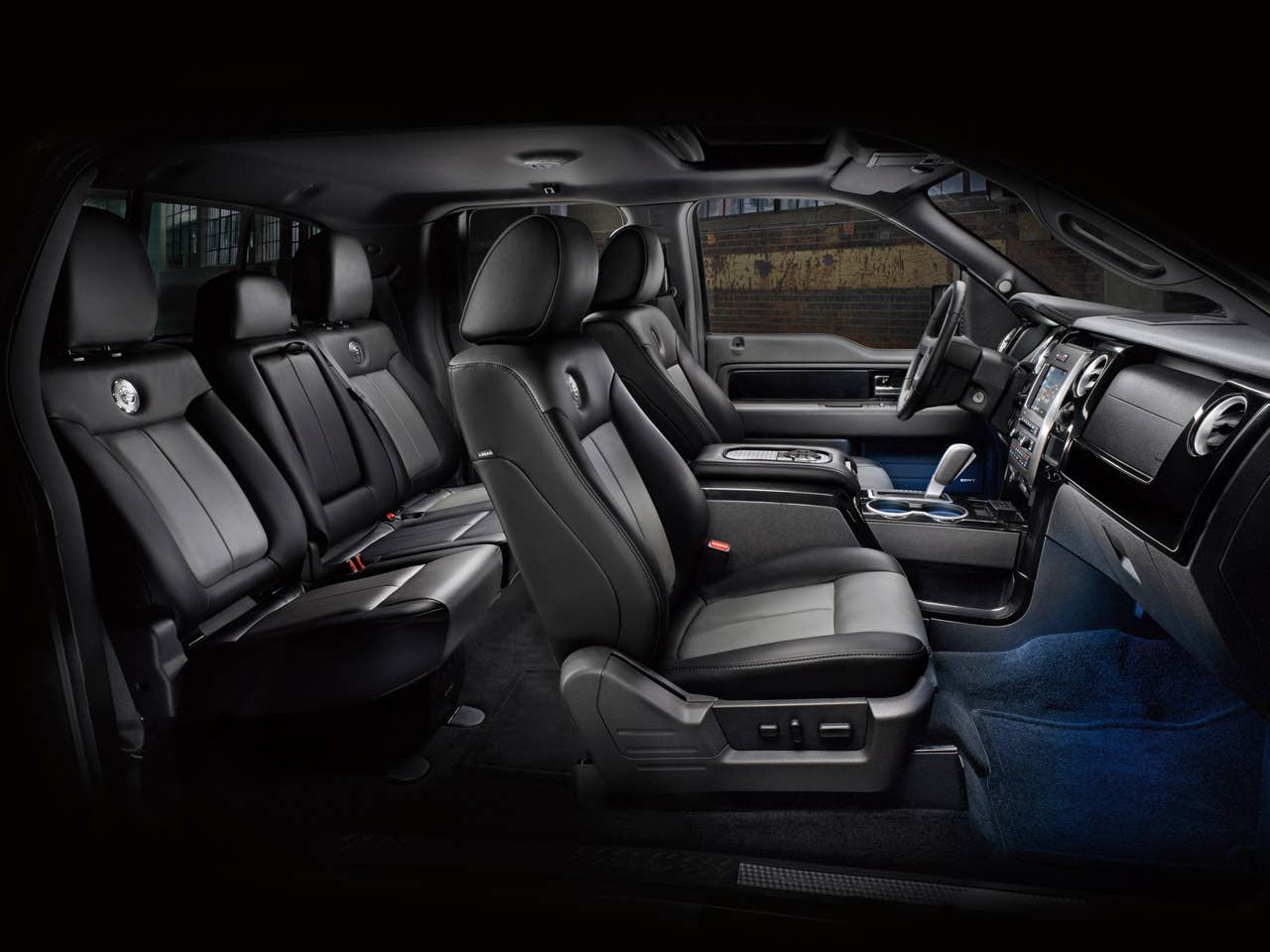 2011 Ford Harley-Davidson F-150: Interior trim panels on the 2011 Ford Harley-Davidson F-150 are covered in Tuxedo Black paint, while the door scuff plate and console lid carry an engine-turned finish. All interior chrome surfaces feature a new satin finish. Premium leather-trimmed seats come with accent color inserts and a unique cloisonn badge.