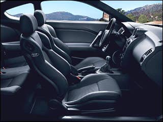 The Tiburon is an affordable sports car that provides modest engine power and a satisfying exhaust note. The Tiburon is available in four trims: the GS, GT, GT Limited, and SE. The base GS model has a 138 hp 2.0-liter four-cylinder engine paired with a five-speed manual or optional four-speed automatic transmission. A 172 hp 2.7-liter V6 engine powers the other models, with the GT models carrying a five-speed manual or available four-speed automatic transmission, and the SE models carrying a six-speed manual transmission. Safety features such as side-impact airbags and four-wheel antilock brakes come standard.Research the Hyundai TiburonHyundai Tiburon OverviewHyundai Tiburon Pictures